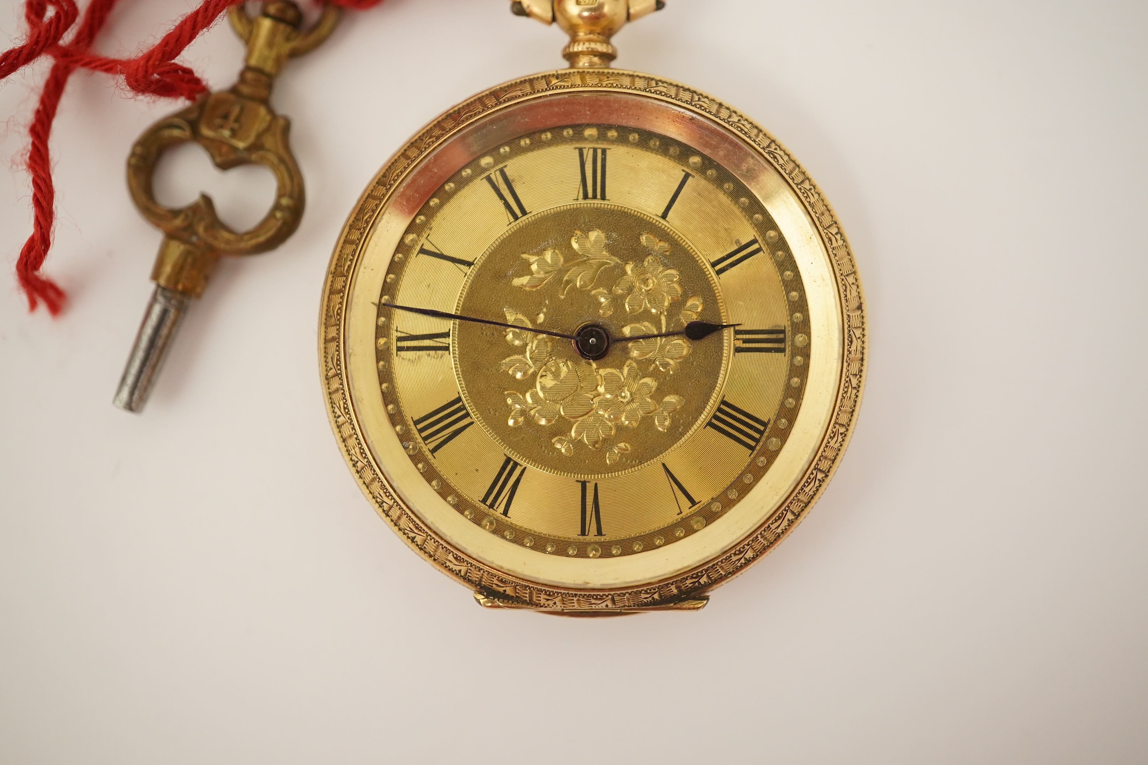 An early 20th century continental engraved 18k gold open faced fob watch